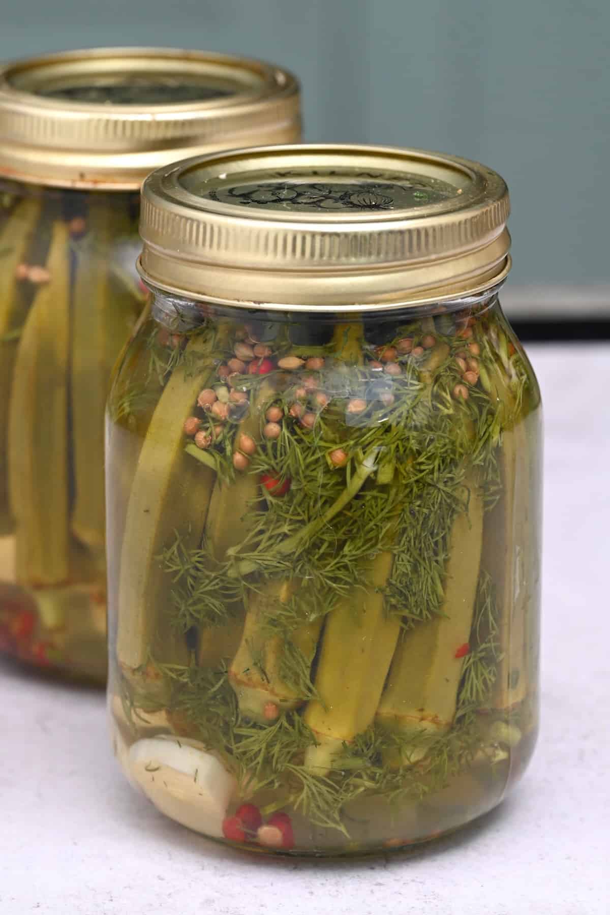 Two jars with okra pickles