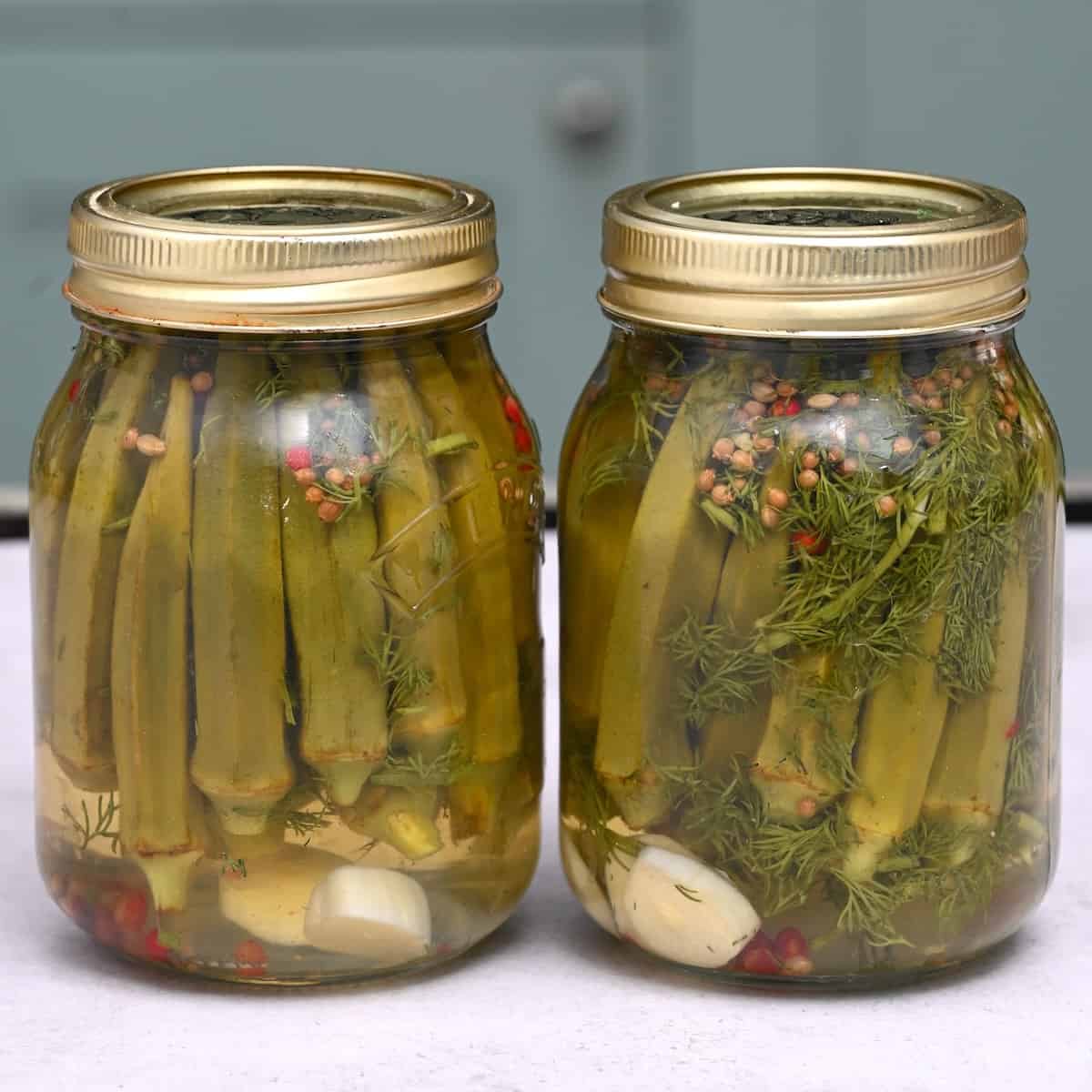 Two jars with homemade pickled okra