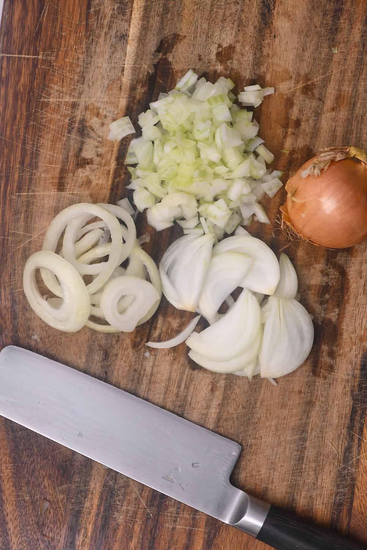 A knife and some chopped onions
