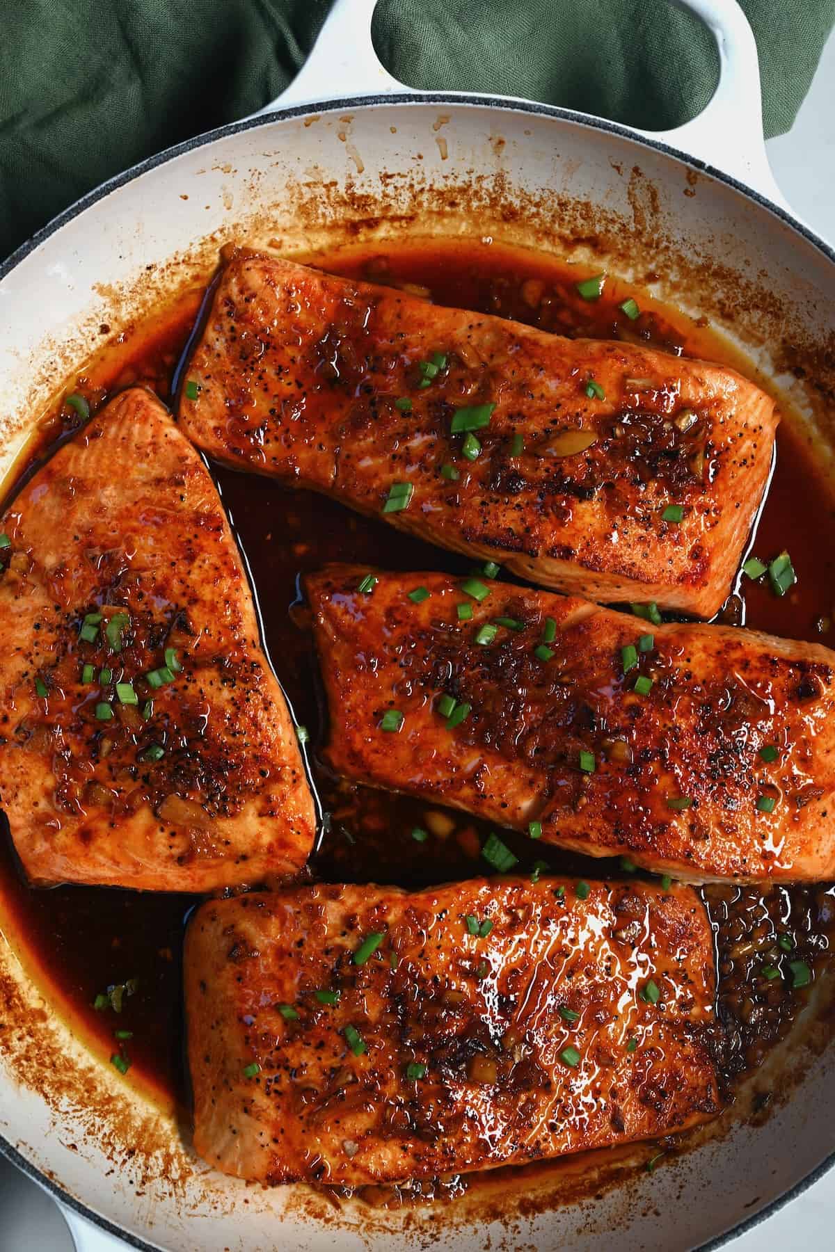 Honey glazed salmon in a pan
