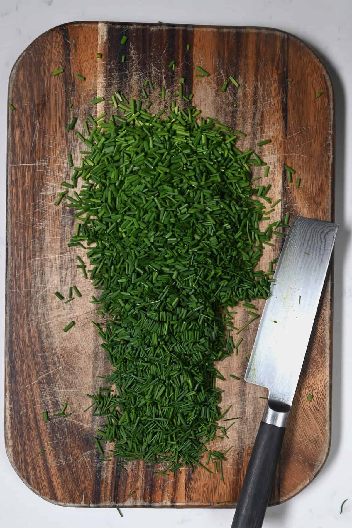 Chopped chives on a cutting board