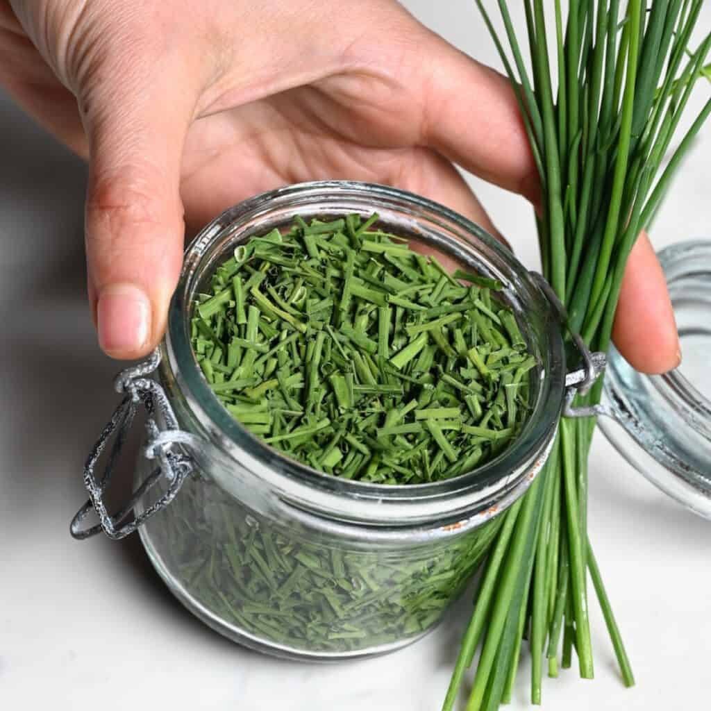 A small jar with dehydrated chives