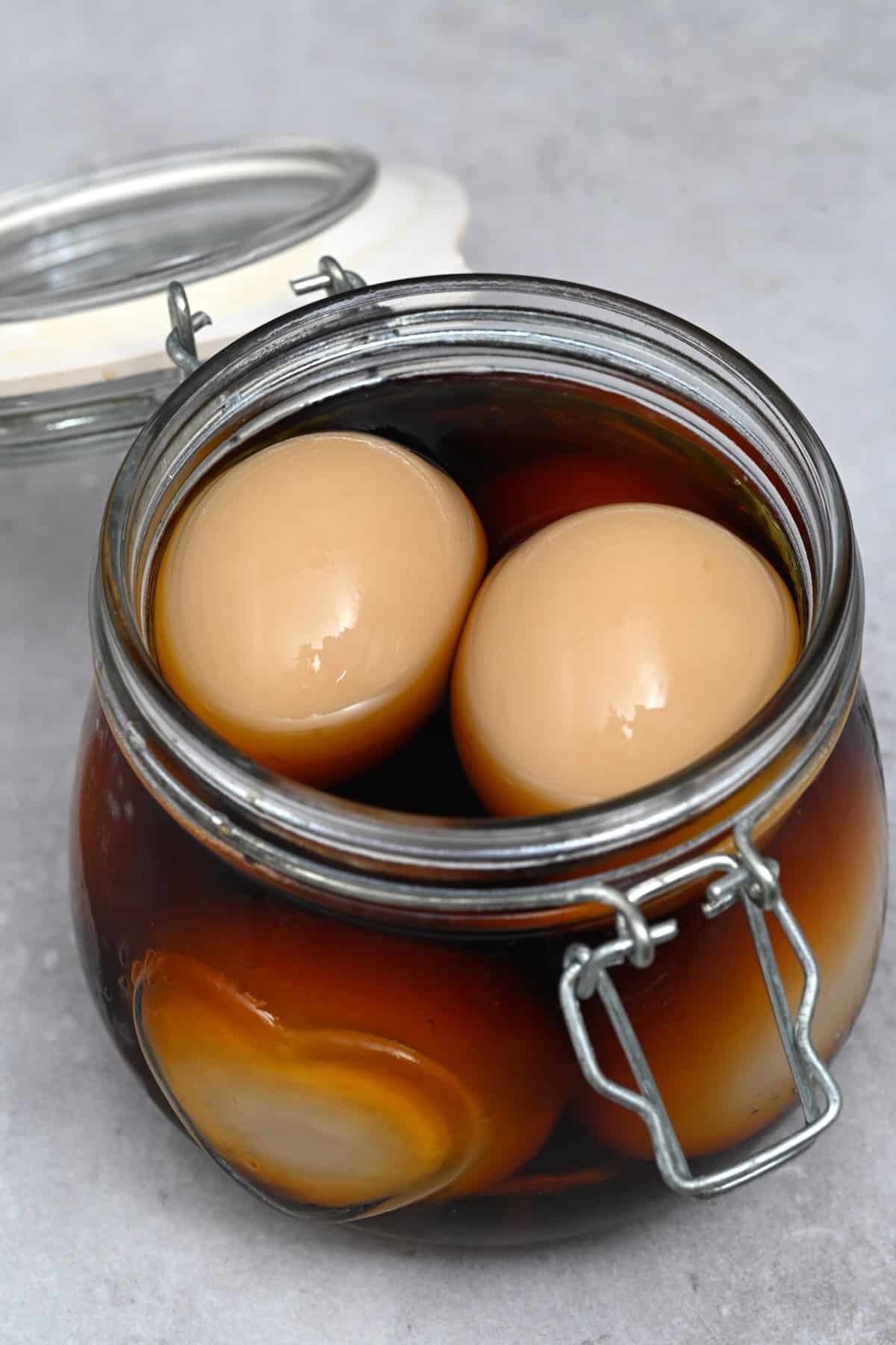 A jar with marinated ramen eggs