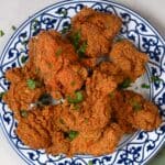 Reheated leftover fried chicken on a plate - 7