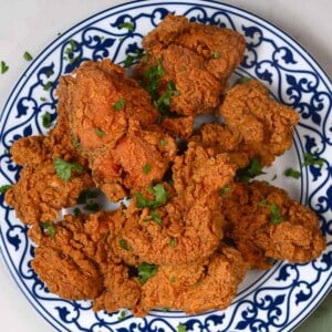 Reheated leftover fried chicken on a plate