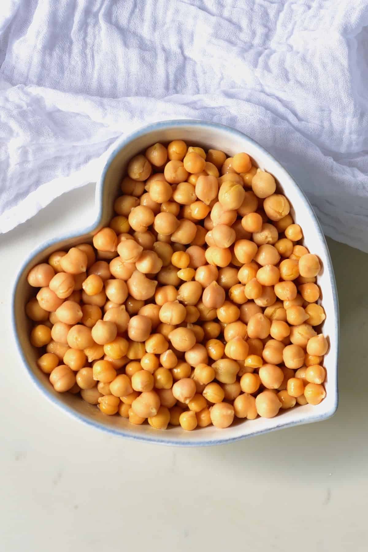 A bowl with cooked chickpeas