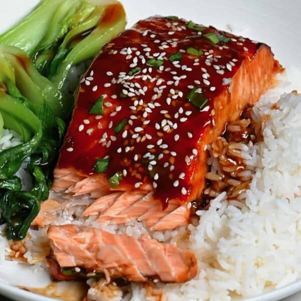 A serving of salmon with bok choi and rice