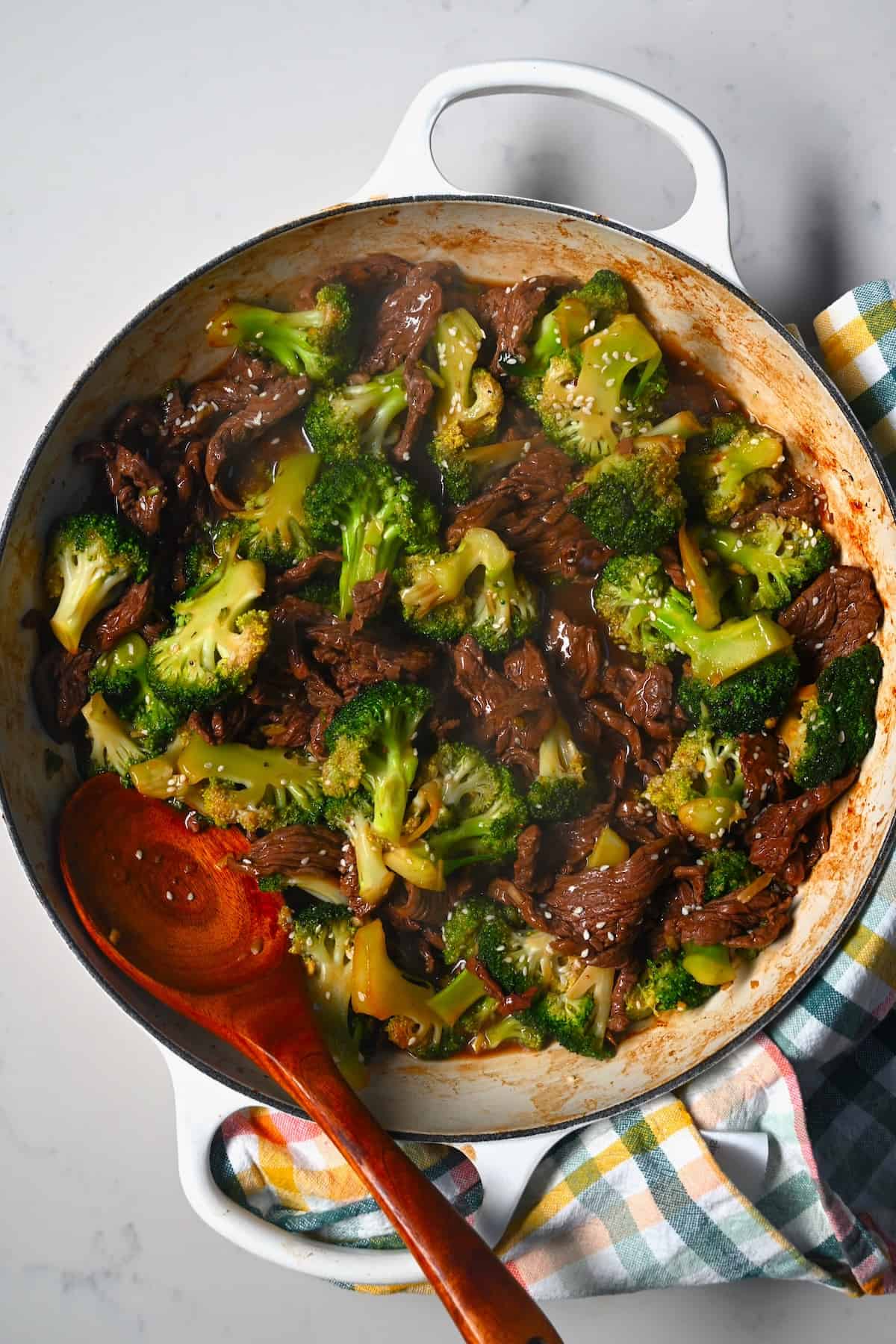 Beef and broccoli stir fry in a skillet
