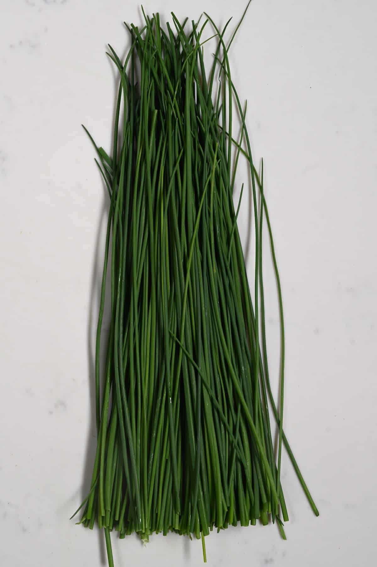 Chives on a flat surface
