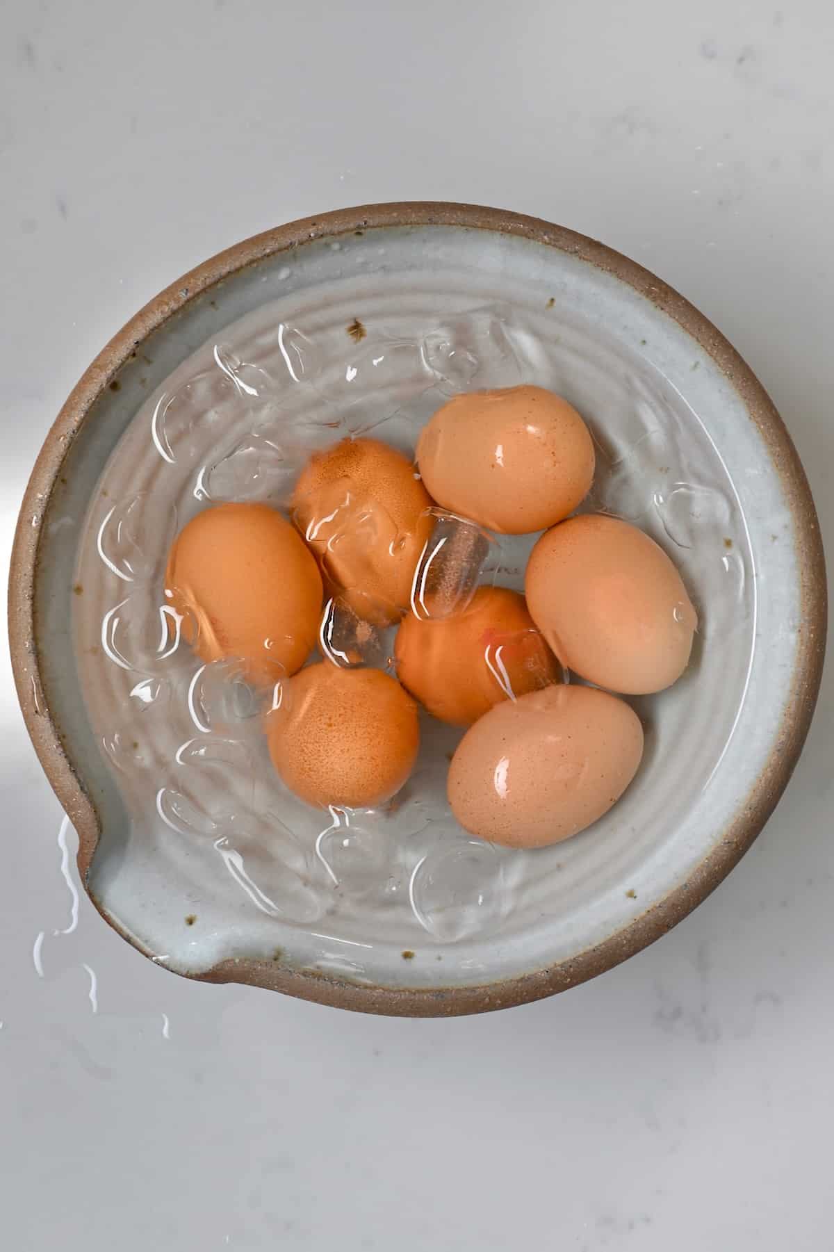 Cooking eggs in ice bath