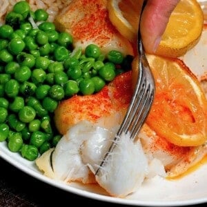 Air fried cod served with peas and rice