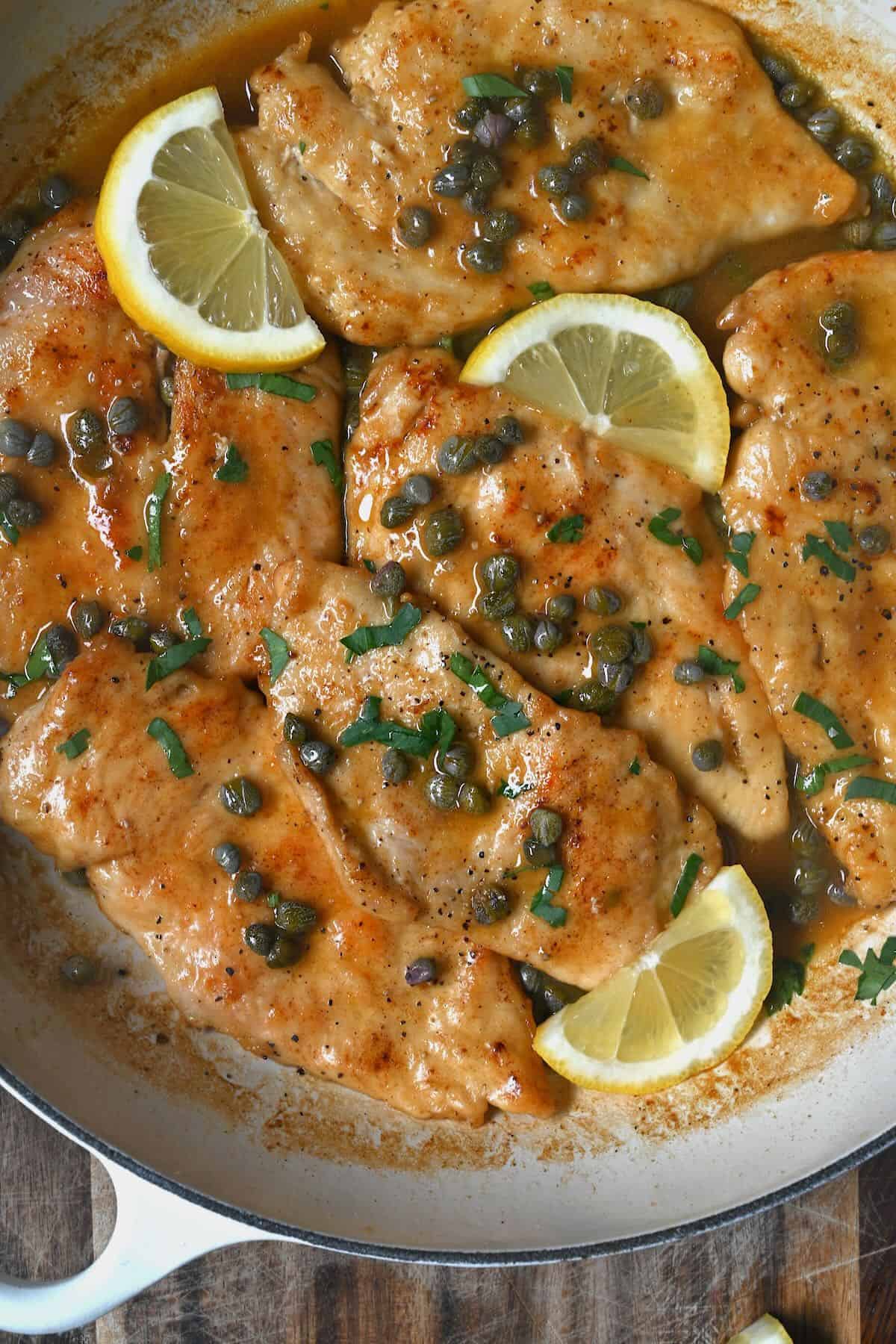 Chicken piccata freshly made in a large pan