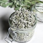 A jar with dried oregano leaves - 12