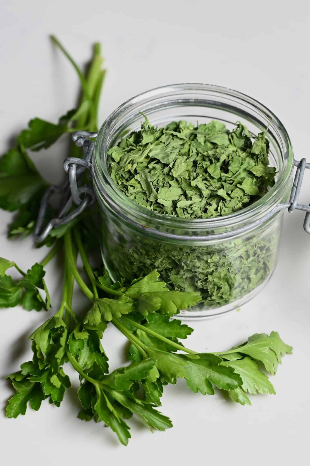 A small jar with homemade dried parsley