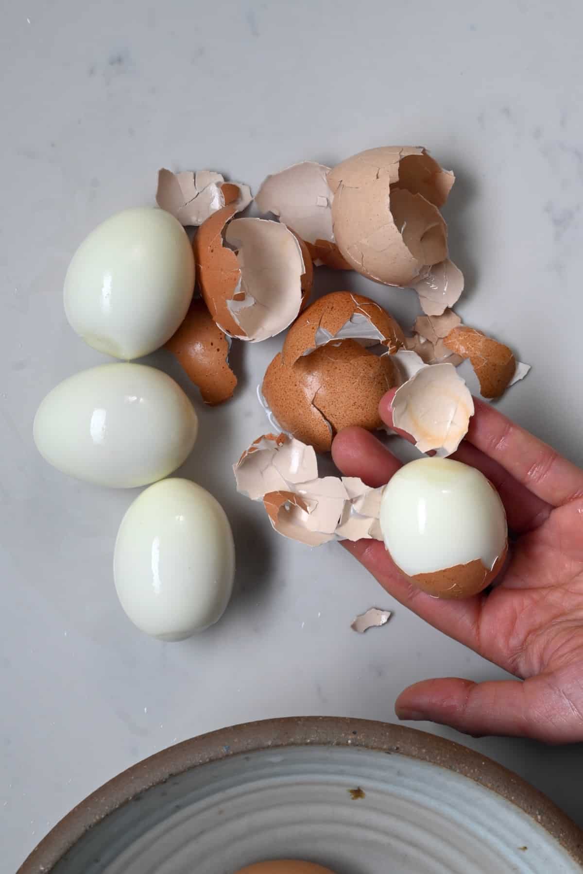 Peeling cooked eggs