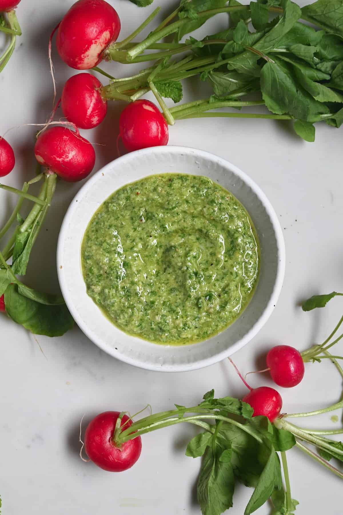 A small bowl with radish greens pesto