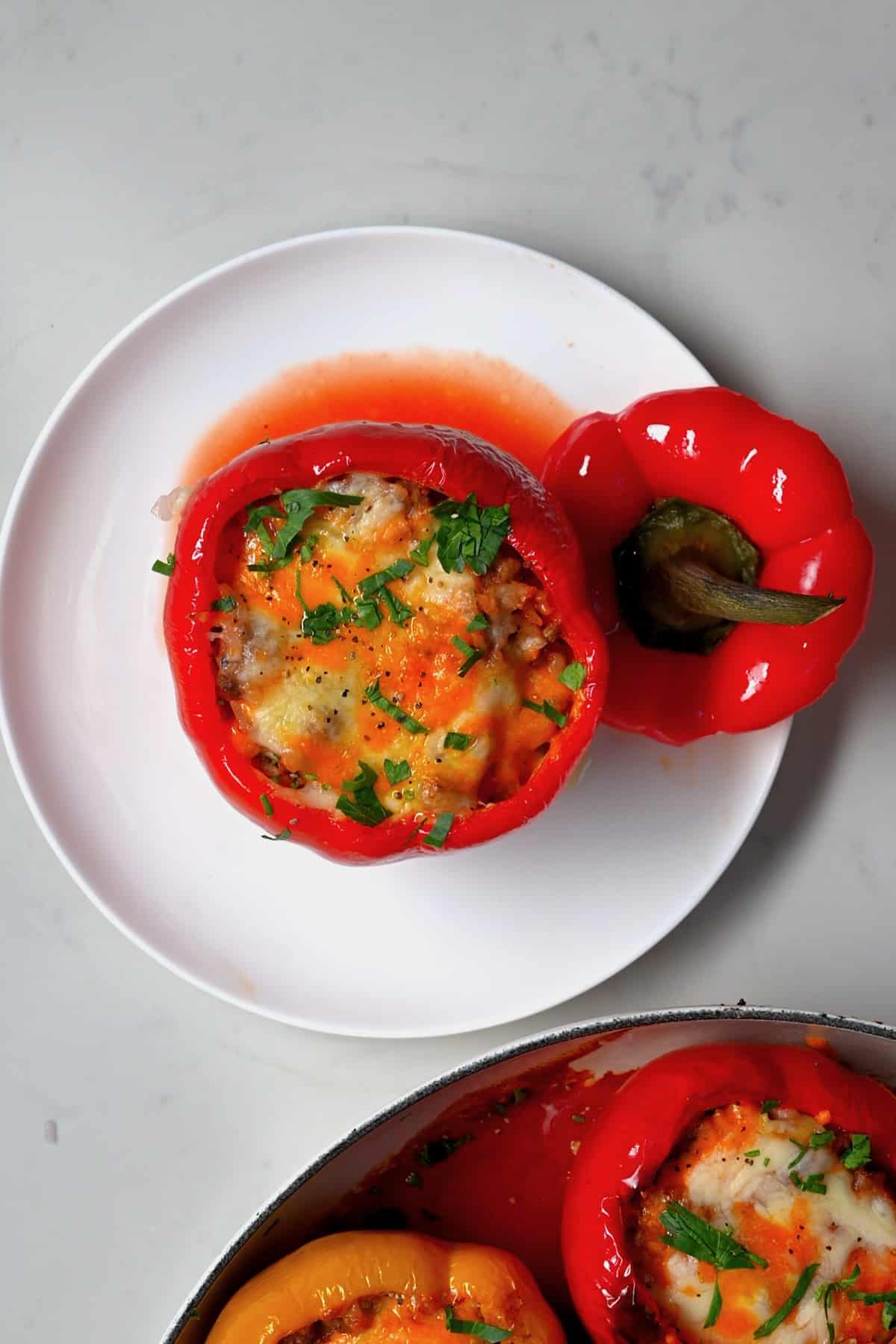 A serving of stuffed red bell pepper