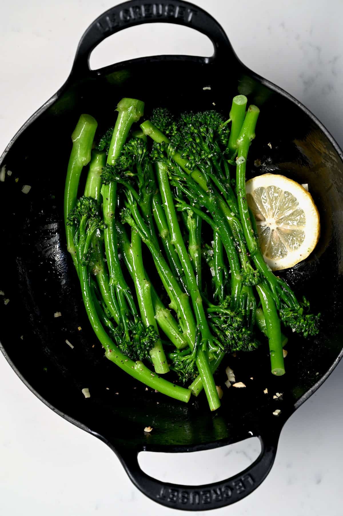 Sauteed broccolini in a pan