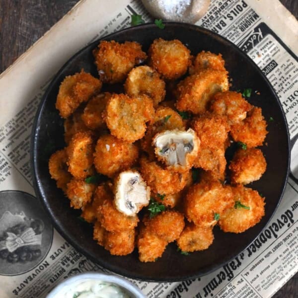 A bowl with fried mushrooms