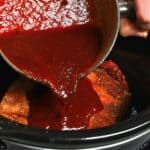 Pouring homemade BBQ sauce over brisket - 10