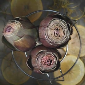 Three artichokes cooked in an instant pot