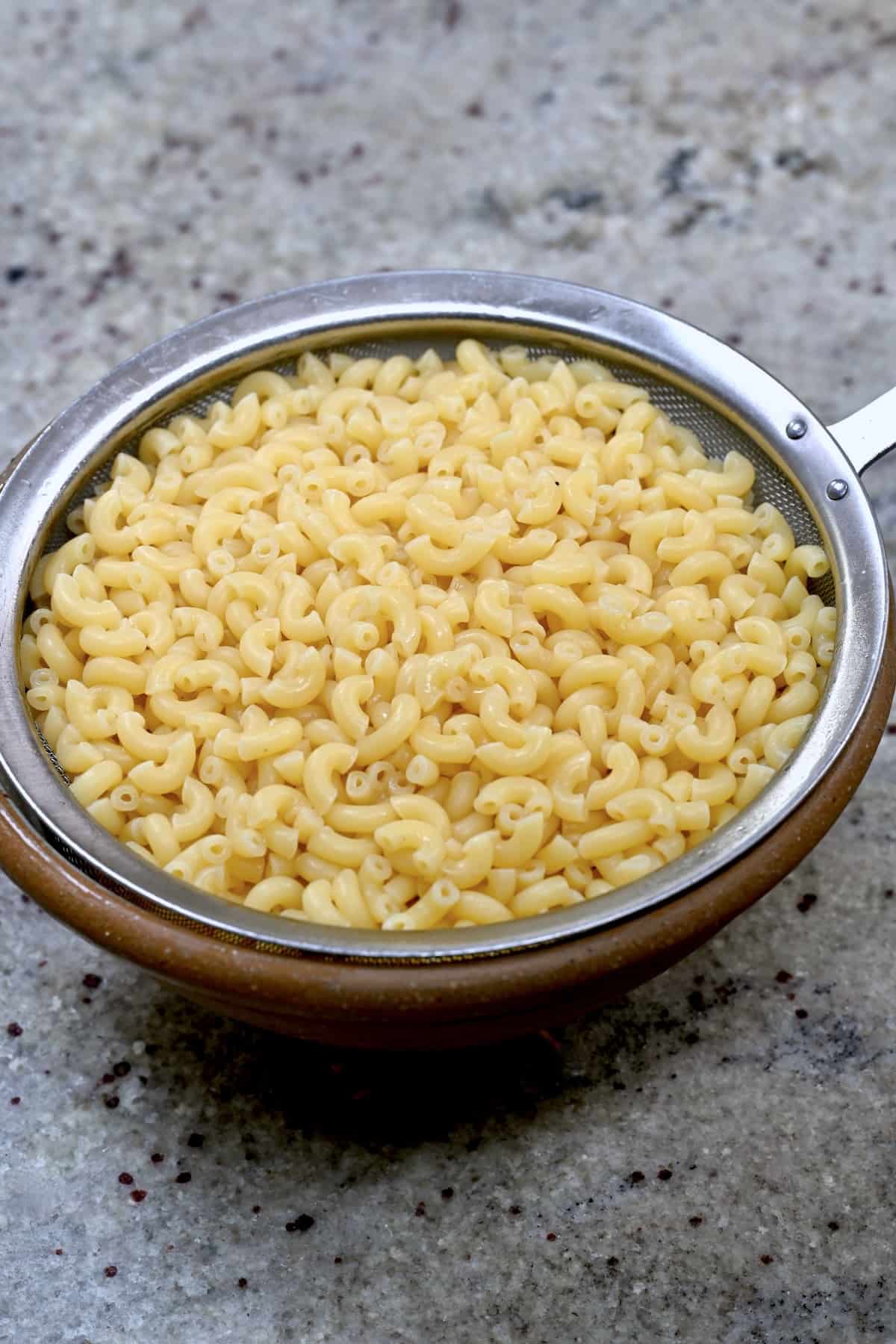 Boiled elbow pasta in a bowl