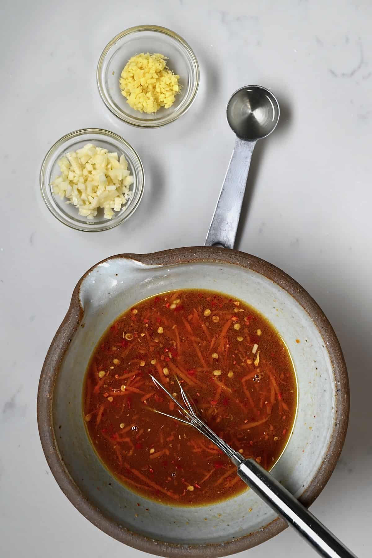 Prepared orange sauce in a bowl