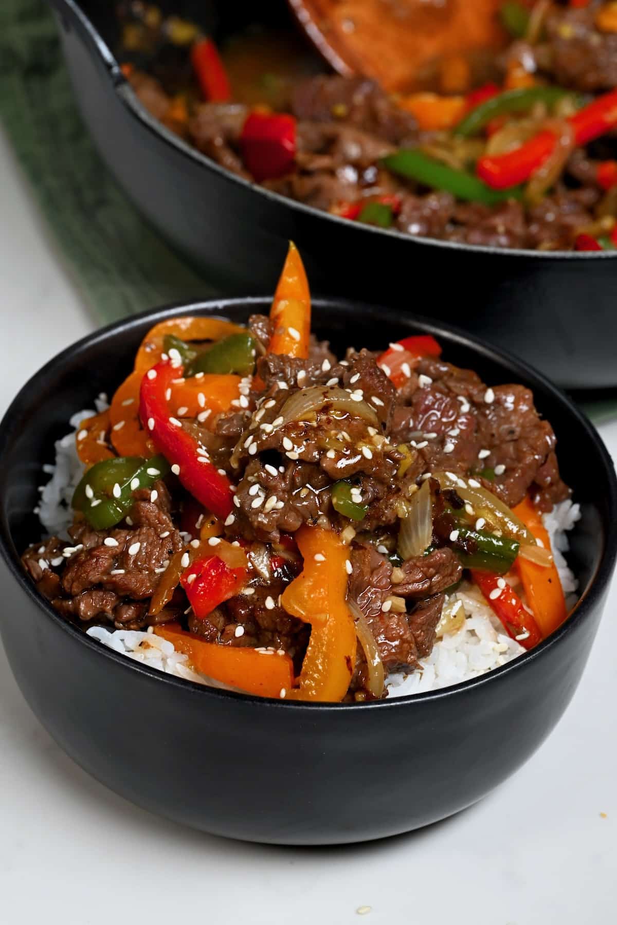 A serving of rice and pepper steak