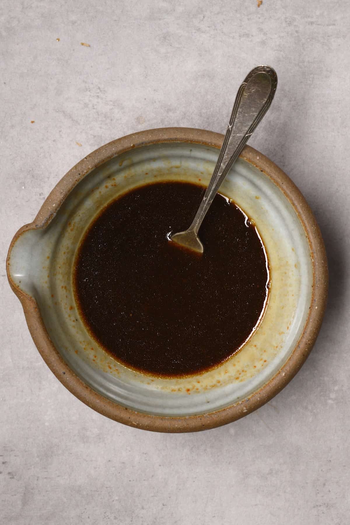 A bowl with a sauce mixture
