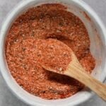 Homemade burger seasoning spice blend in a small bowl with a spoon - 10