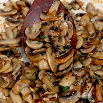 A spoonful of sauteed mushrooms