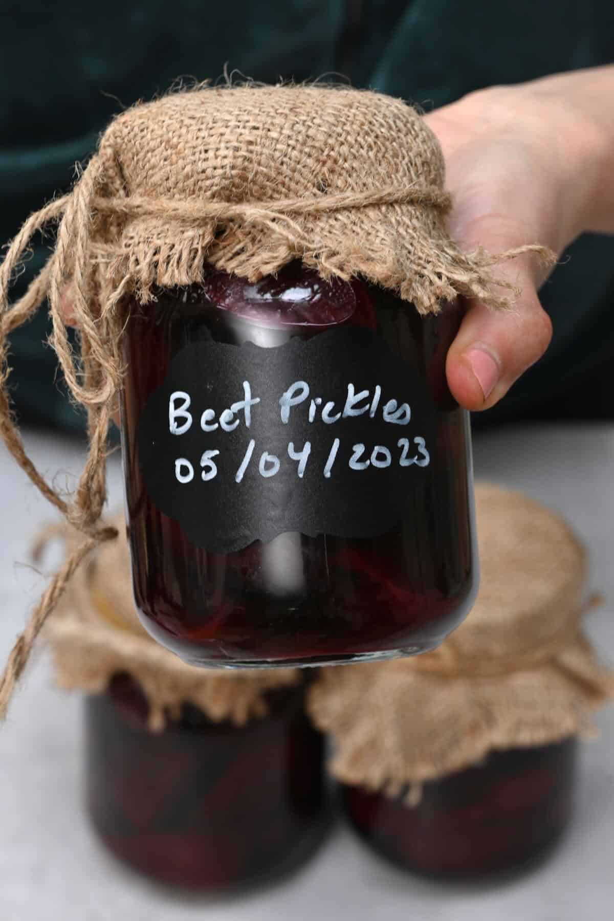 A jar with beet pickles