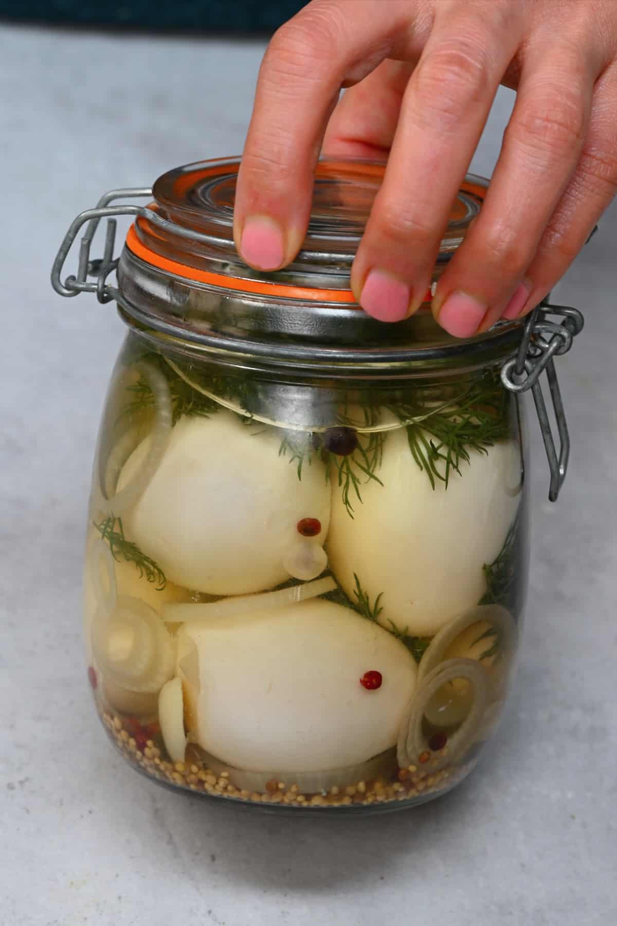 A jar with homemade pickled eggs