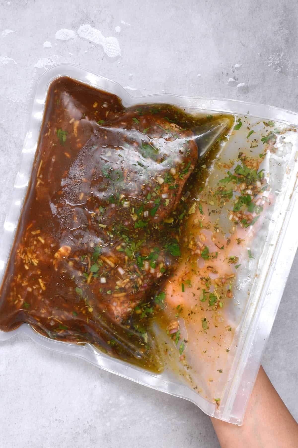 Marinating steak in a reusable bag