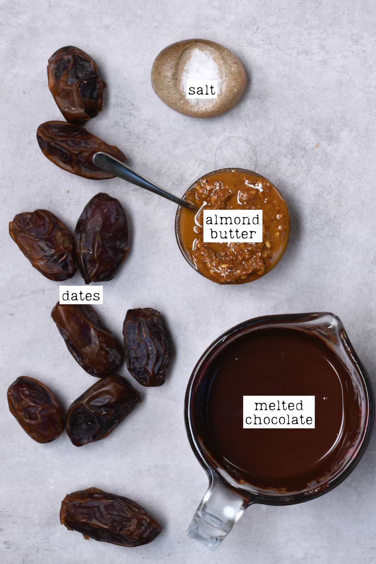 Ingredients for stuffing dates with almond butter
