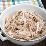 A serving bowl with shredded chicken - 12