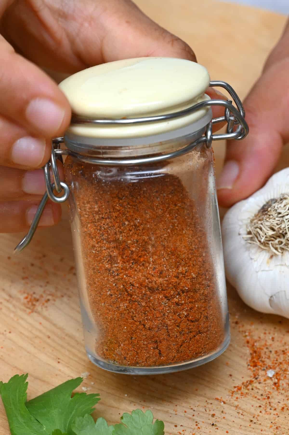 A small jar with chili seasoning