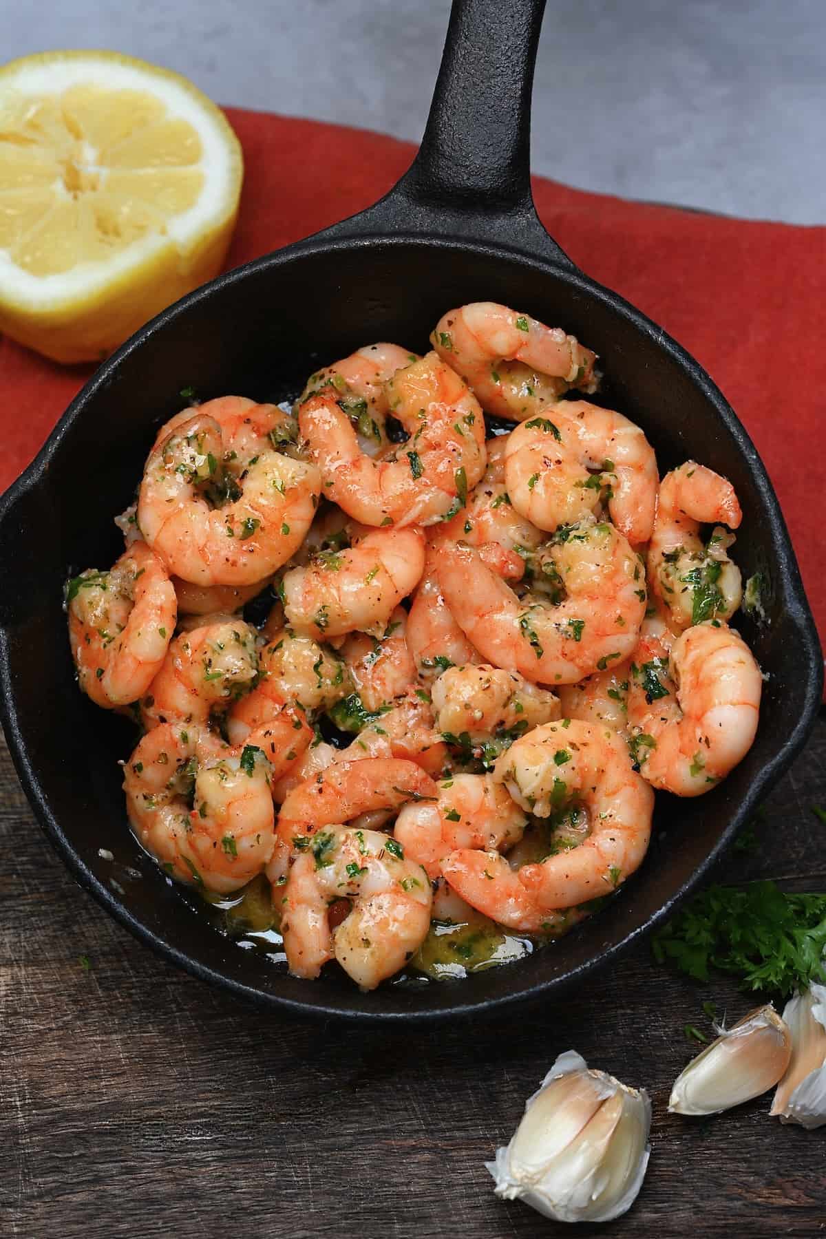 A small pan with cooked shrimp
