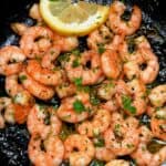 Garlic butter shrimp in a skillet with lemon - 12