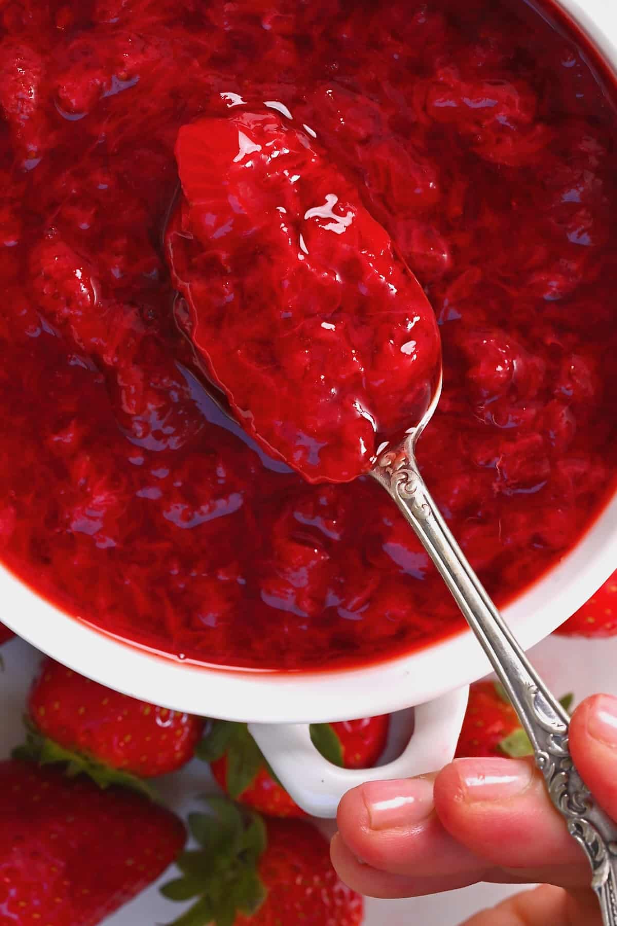 A spoonful of strawberry sauce
