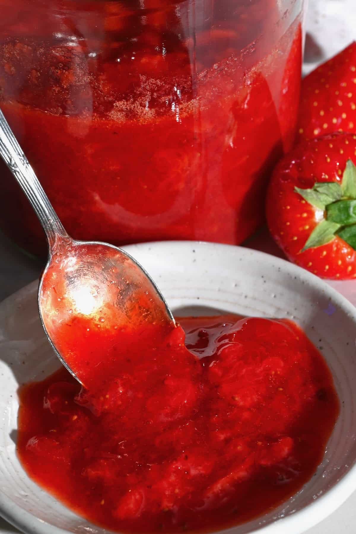 A spoonful of homemade strawberry sauce