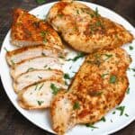 Air fried juicy chicken cut on a plate - 12