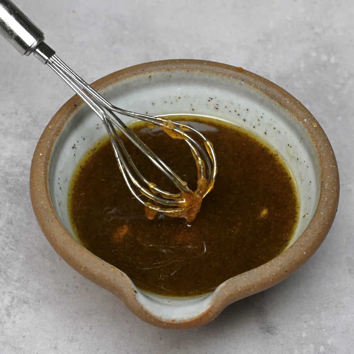 Chicken marinade in a small bowl