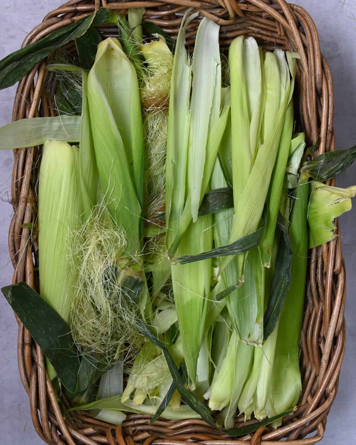 Empty corn husks in a basket