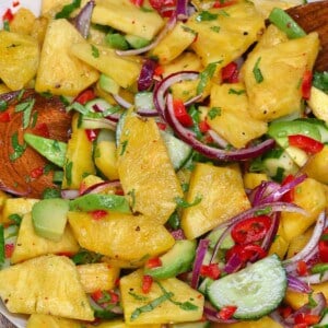 A close up of pineapple cucumber salad