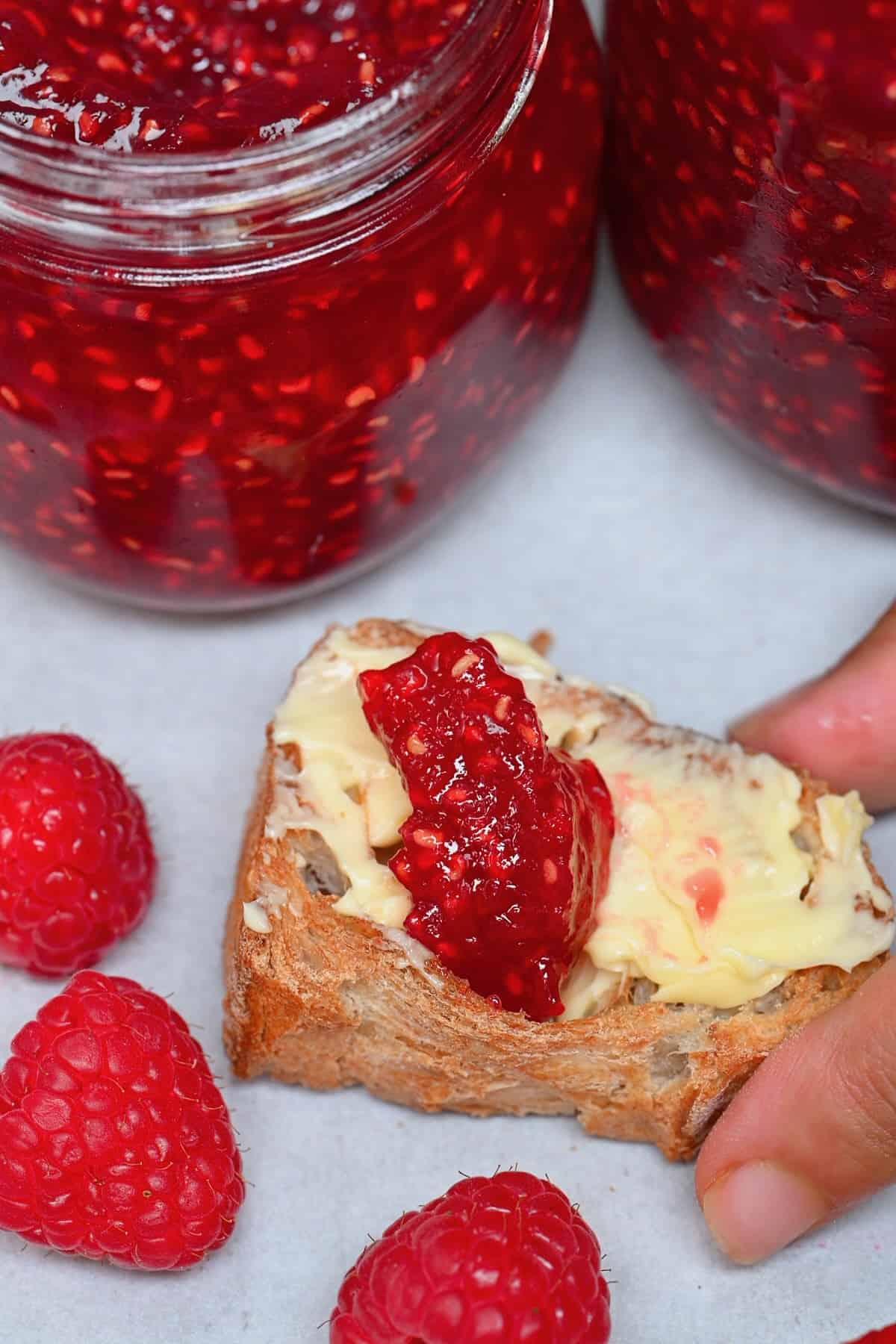 Raspberry jam and butter on bread