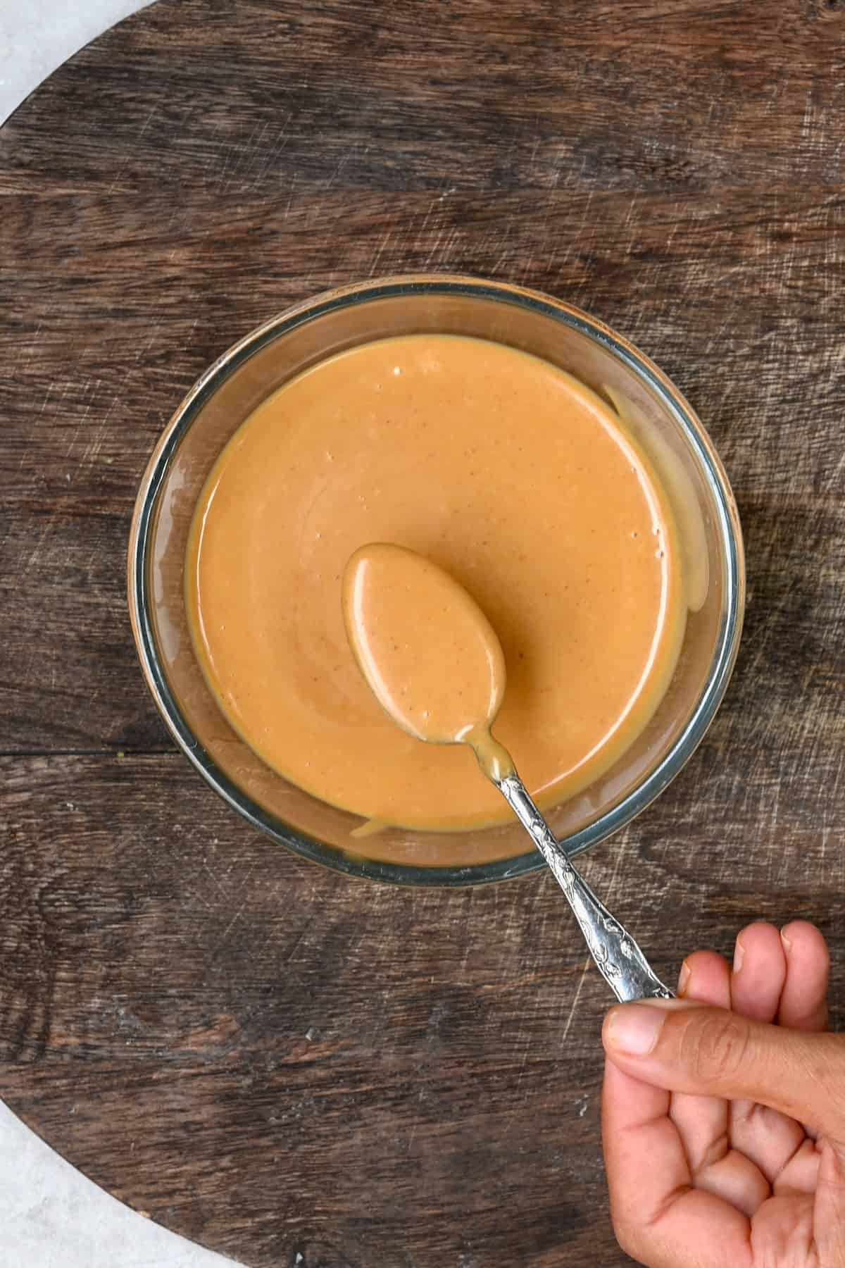 A spoonful of homemade chick fil a sauce