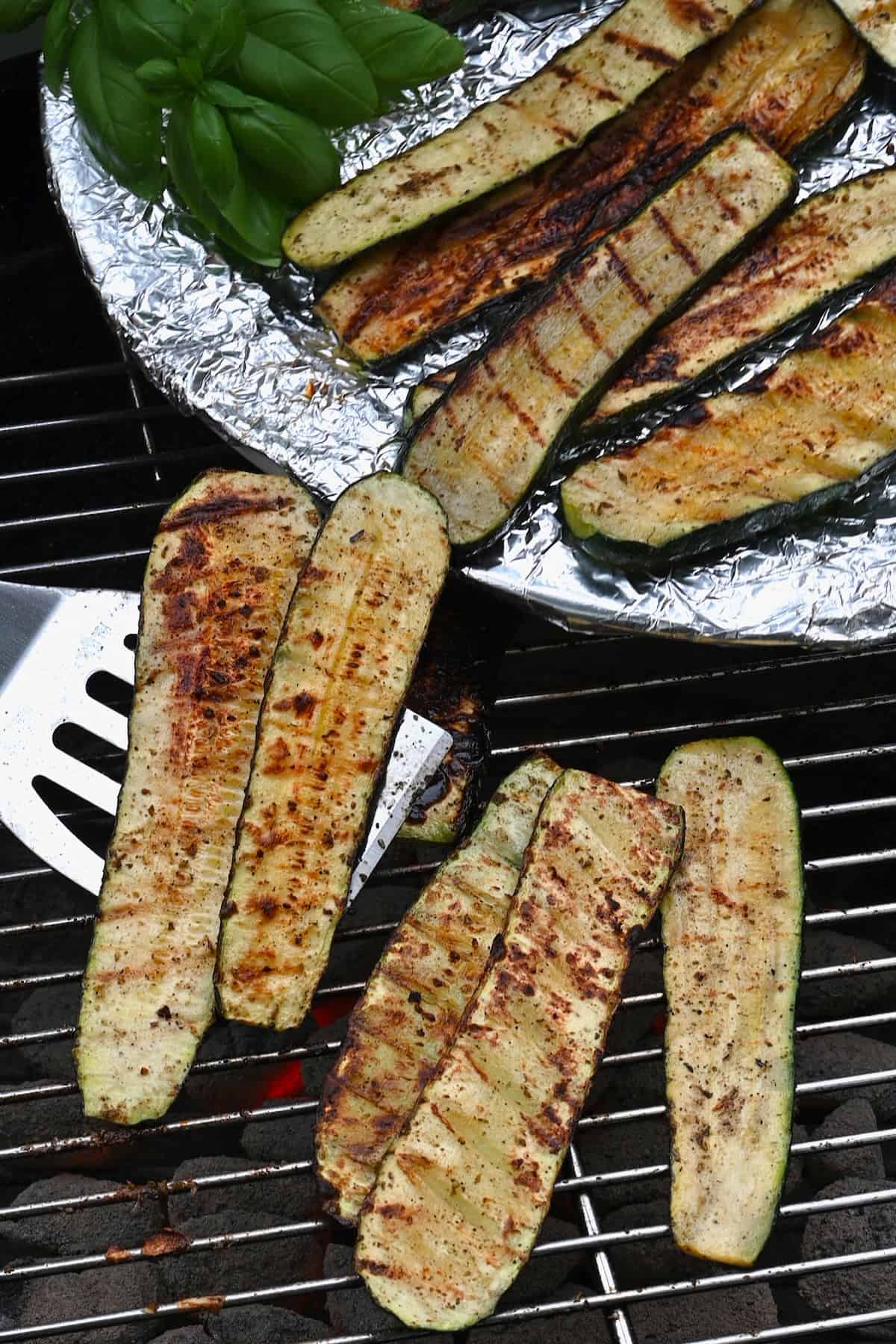Removing cooked zucchini from grill