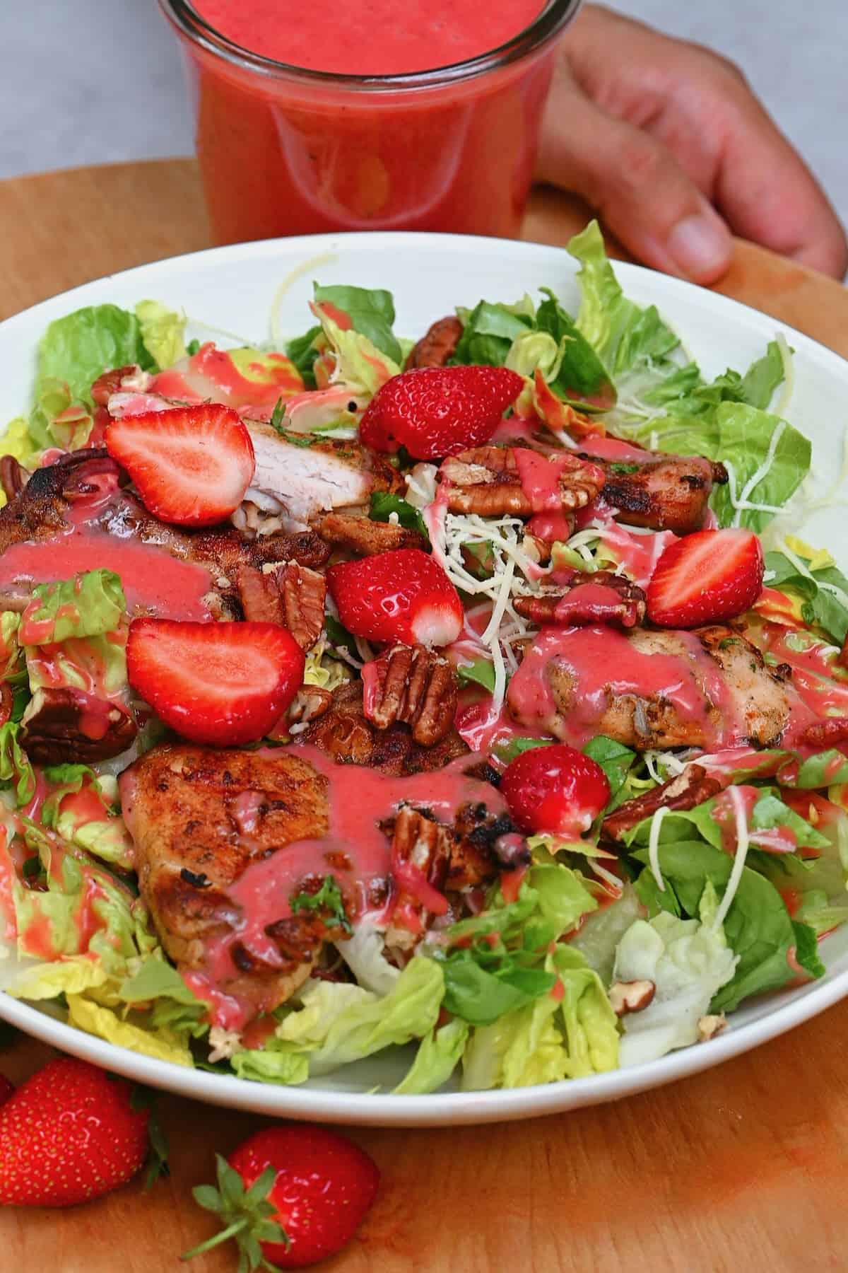 A fresh salad with strawberry vinaigrette