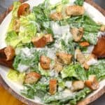 Homemade Caesar salad in a large serving bowl - 11